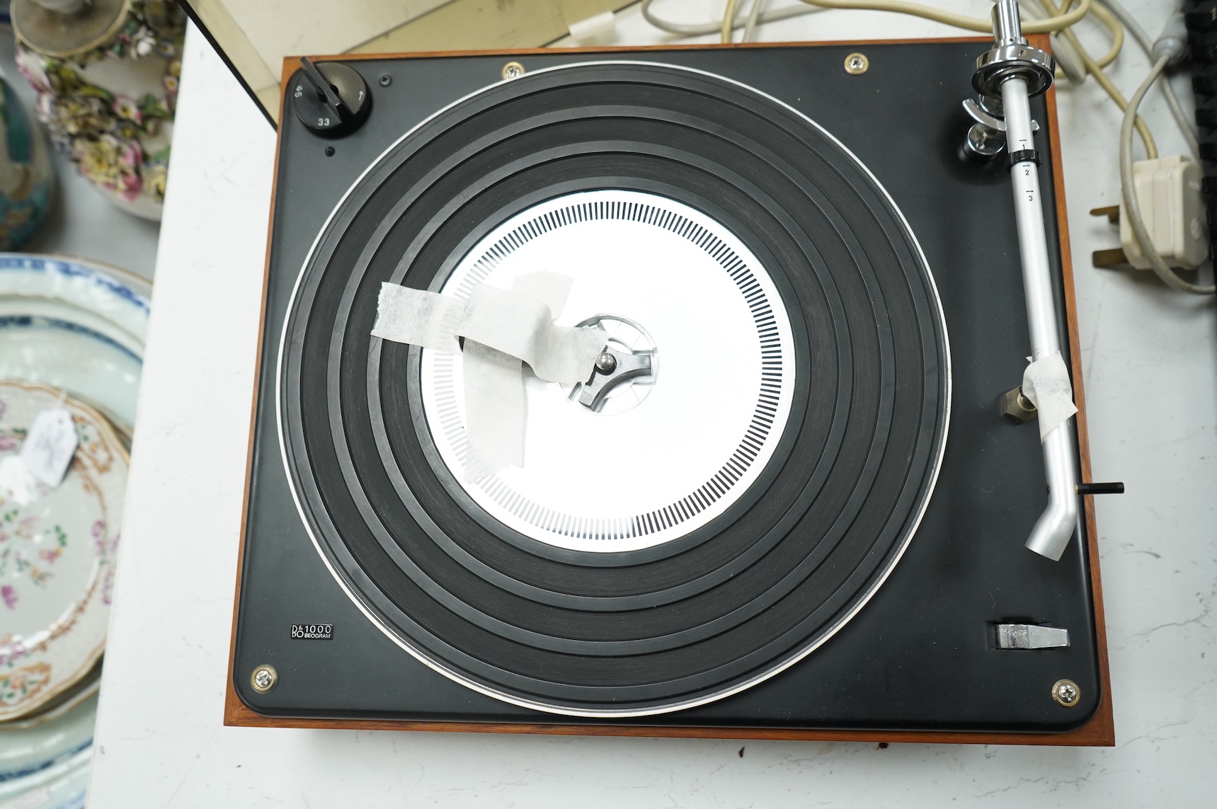 Four Bang & Olufsen stereo items; a Beogram 1000 type 5229 turntable, a Beomaster 4000 type 2406, a Beomaster 901 type 2606, and a Beomaster 1900 type 2903